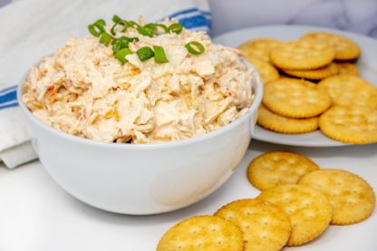 Cajun Crab Dip In Bowl With Ritz Crackers